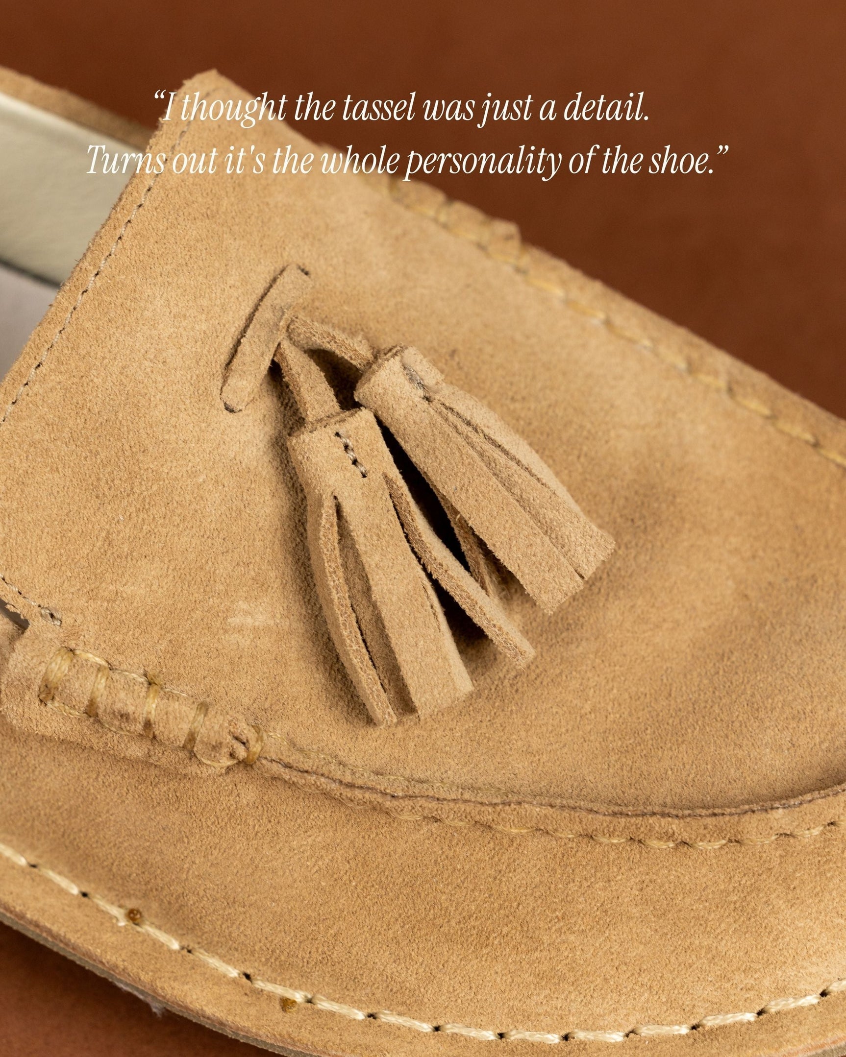 Tan suede desert boot with tassel detail on the vamp and stitched sole.