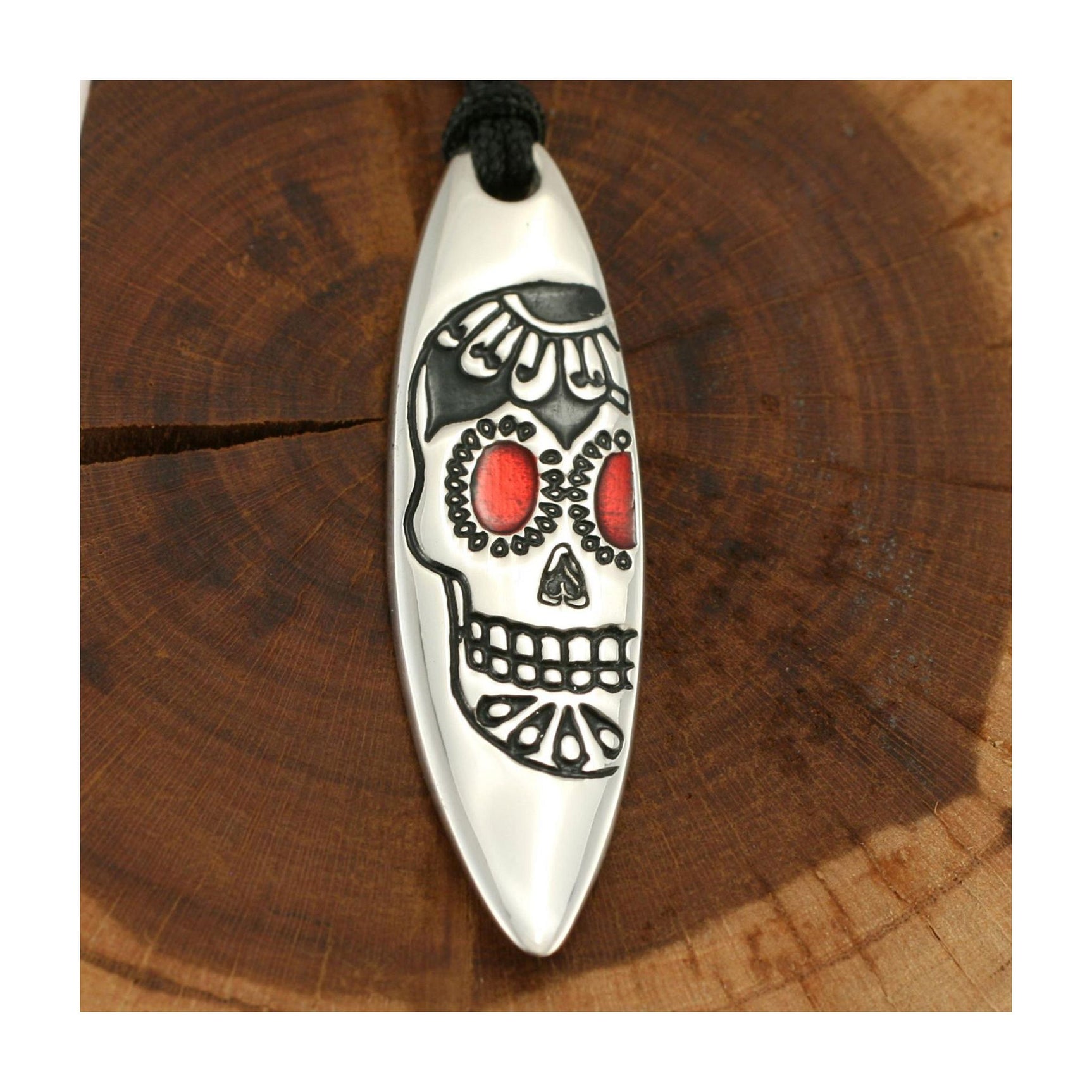 Silver+Surf silver jewelry surfboard with skull